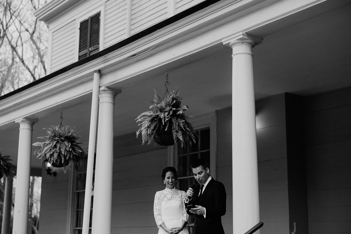 The Lyman Estate Wedding toasts on the veranda